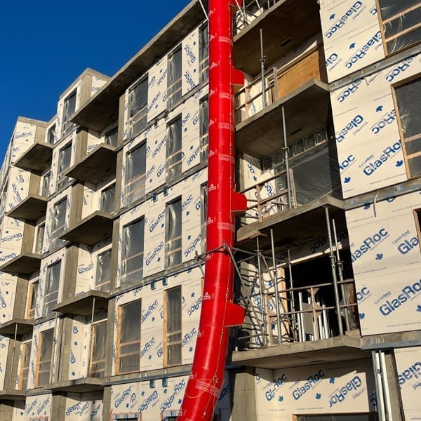 Red Superchute installed on a building.