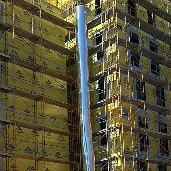 Steel Superchute installed on a scaffold tower.