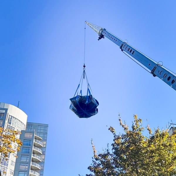 Removing construction debris with a StrongSliing tarp.